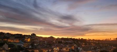 colorful late afternoon sunset in the countryside of Brazil photo