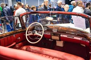 FRIEDRICHSHAFEN - MAY 2019 red interior MERCEDES-BENZ 220 S PONTON W187 1957 cabrio at Motorworld Classics Bodensee on May 11, 2019 in Friedrichshafen, Germany photo