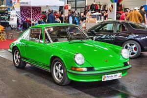 FRIEDRICHSHAFEN - MAY 2019 green PORSCHE 911 930 964 CARRERA 4 1977 cabrio at Motorworld Classics Bodensee on May 11, 2019 in Friedrichshafen, Germany photo