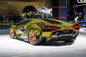 FRANKFURT, GERMANY - SEPT 2019 yellow golden LAMBORGHINI SIAN FKP 37 is a mid-engine hybrid sports car. It is the first hybrid production vehicle produced by the brand, IAA International Motor Show Au photo