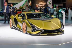 FRANKFURT, GERMANY - SEPT 2019 yellow golden LAMBORGHINI SIAN FKP 37 is a mid-engine hybrid sports car. It is the first hybrid production vehicle produced by the brand, IAA International Motor Show Au photo