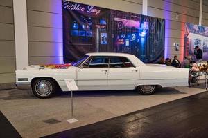 FRIEDRICHSHAFEN - MAY 2019 white CADILLAC HARDTROP SEDAN DE VILLE 3 1966 coupe at Motorworld Classics Bodensee on May 11, 2019 in Friedrichshafen, Germany photo