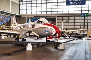 FRIEDRICHSHAFEN - MAY 2019 silver white red plane DE HAVILLAND DH-104 DOVE 8 D-INKA 1945 at Motorworld Classics Bodensee on May 11, 2019 in Friedrichshafen, Germany photo