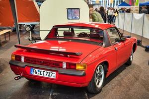 FRIEDRICHSHAFEN - MAY 2019 red PORSCHE 914 GT TARGA 1971 at Motorworld Classics Bodensee on May 11, 2019 in Friedrichshafen, Germany photo