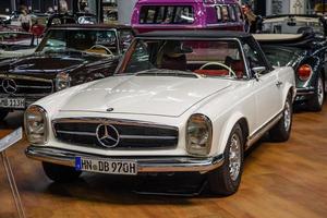 SINSHEIM, GERMANY - MAI 2022 white Mercedes Benz 280 SL 1970 cabrio photo