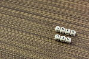 wooden text  for father day content close up image. photo