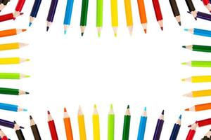 Background isolates of crayons in a variety of beautiful colors. photo