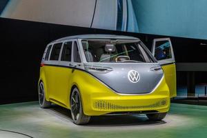 FRANKFURT, GERMANY - SEPT 2019 yellow gray VOLKSWAGEN VW I.D. BUZZ or VW Electric Microbus, is an electric minivan based on the electric MEB platform, IAA International Motor Show Auto Exhibtion photo