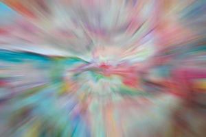 Abstract, blurry, radial plasticine background which combines various colors. photo