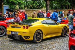 GERMANY, FULDA - JUL 2019 rearview lights of yellow FERRARI F43 photo