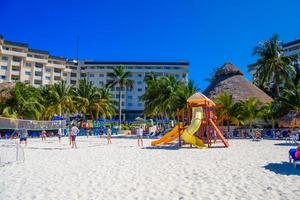 Playground for kinds near hotel on the sandy beach on a sunny day in Cancun, Yukatan, Mexico photo