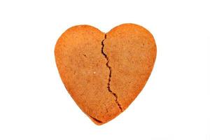 Biscuit like a broken heart shape, isolated on white background