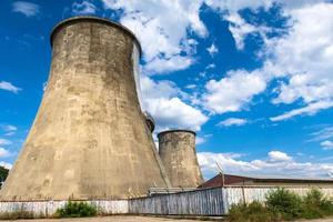 incredibly huge, industrial chimney made of concrete blocks. Concept of preserving the environment and taking care of nature photo