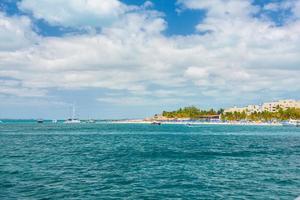 Port with sailboats and ships in Isla Mujeres island in Caribbean Sea, Cancun, Yucatan, Mexico photo