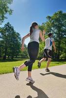 Couple jogging outside photo