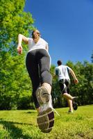 Couple jogging outside photo