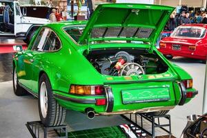 FRIEDRICHSHAFEN - MAY 2019 engine of green lime PORSCHE 911 930 964 CARRERA 4 1990 cabrio at Motorworld Classics Bodensee on May 11, 2019 in Friedrichshafen, Germany photo