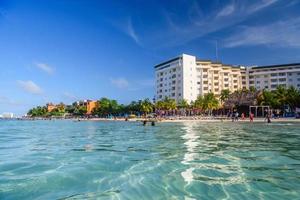 Ripple in the water near hotel on the sandy beach in Cancun, Yukatan, Mexico photo