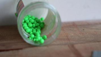 airsoft gun bullets made of green plastic photo