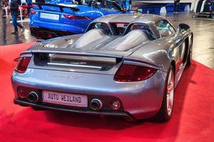 FRIEDRICHSHAFEN - MAY 2019 silver PORSCHE CARRERA GT 2002 at Motorworld Classics Bodensee on May 11, 2019 in Friedrichshafen, Germany photo