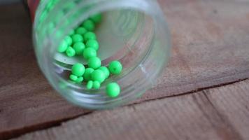 airsoft gun bullets made of green plastic photo