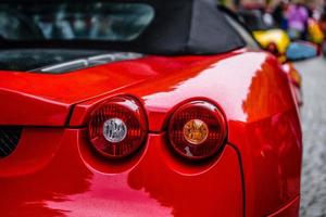 GERMANY, FULDA - JUL 2019 red FERRARI F430 Type F131 cabrio is a sports car produced by the Italian automobile manufacturer Ferrari from 2004 to 2009 as a successor to the Ferrari 360. The car is an u photo