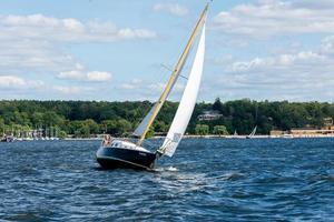 Berlin, Berlin Germany  07.23.2018 Sailboat on the Wannsee in a curve photo