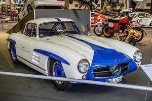 SINSHEIM, GERMANY - MAI 2022 white blue Mercedes-Benz 300 SL gullwinged coupe photo