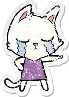 distressed sticker of a crying cartoon cat in dress pointing vector