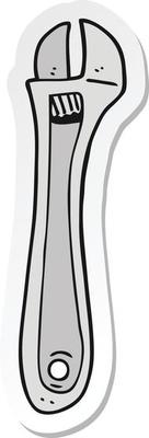 sticker of a cartoon spanner