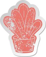 distressed old sticker of a green indoor plant vector