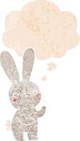 cute cartoon rabbit and thought bubble in retro textured style vector