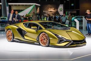 FRANKFURT, GERMANY - SEPT 2019 yellow golden LAMBORGHINI SIAN FKP 37 is a mid-engine hybrid sports car. It is the first hybrid production vehicle produced by the brand, IAA International Motor Show Au photo