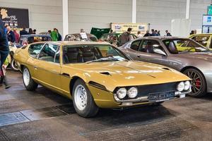 FRIEDRICHSHAFEN - MAY 2019 sand golden LAMBORGHINI ESPADA 400 GT 1972 coupe at Motorworld Classics Bodensee on May 11, 2019 in Friedrichshafen, Germany photo