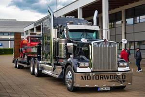 FRIEDRICHSHAFEN - MAY 2019 black KENWORTH W900 1961 conventional-cab truck at Motorworld Classics Bodensee on May 11, 2019 in Friedrichshafen, Germany photo