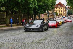 GERMANY, FULDA - JUL 2019 dark gray FERRARI 458 SPIDER coupe was introduced at the 2011 Frankfurt Motor Show. This convertible variant of the 458 Italia features an aluminium retractable hardtop which photo