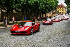 GERMANY, FULDA - JUL 2019 red FERRARI 488 coupe Type F142M is a mid-engine sports car produced by the Italian automobile manufacturer Ferrari. The car is an update to the 458 with notable exterior and photo