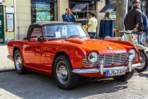 GERMANY, LIMBURG - APR 2017 red TRIUMPH TR4 TR5 1961 in Limburg an der Lahn, Hesse, Germany photo