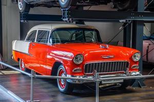 SINSHEIM, GERMANY - MAI 2022 red beige cabrio Chevrolet Bel Air 1955 photo