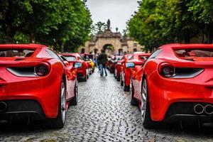 GERMANY, FULDA - JUL 2019 rearview lights of red FERRARI 488 SPIDER Type F142M coupe is a mid-engine sports car produced by the Italian automobile manufacturer Ferrari. The car is an update to the 458 photo