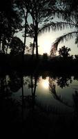 sunrise reflection in water photo