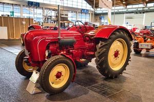 FRIEDRICHSHAFEN - MAY 2019 red PORSCHE L318 TRACTOR 1960 at Motorworld Classics Bodensee on May 11, 2019 in Friedrichshafen, Germany photo