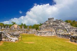 Ancient ruins of Maya in El Rey Archaeological Zone near Cancun, Yukatan, Mexico photo