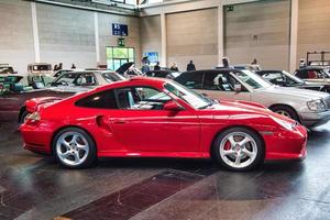 FRIEDRICHSHAFEN - MAY 2019 red PORSCHE 911 996 TURBO coupe 2000 at Motorworld Classics Bodensee on May 11, 2019 in Friedrichshafen, Germany photo