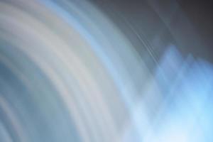 Abstract background, arcs and waves in blue, gray, beige colors. photo