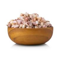 Garlic Group in wooden bowl isolated on white background. photo
