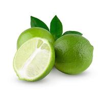 Whole and sliced limes, Sour green fruit isolated on alpha background. photo