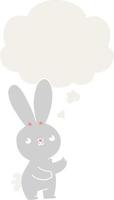 cute cartoon rabbit and thought bubble in retro style vector