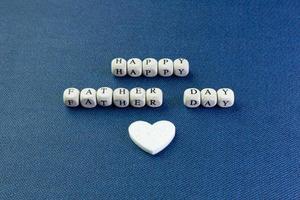 wooden text  for father day content close up image. photo