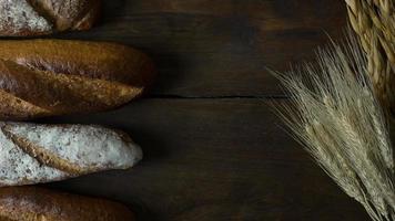 Bread  Wheat oats on wood  image background. photo